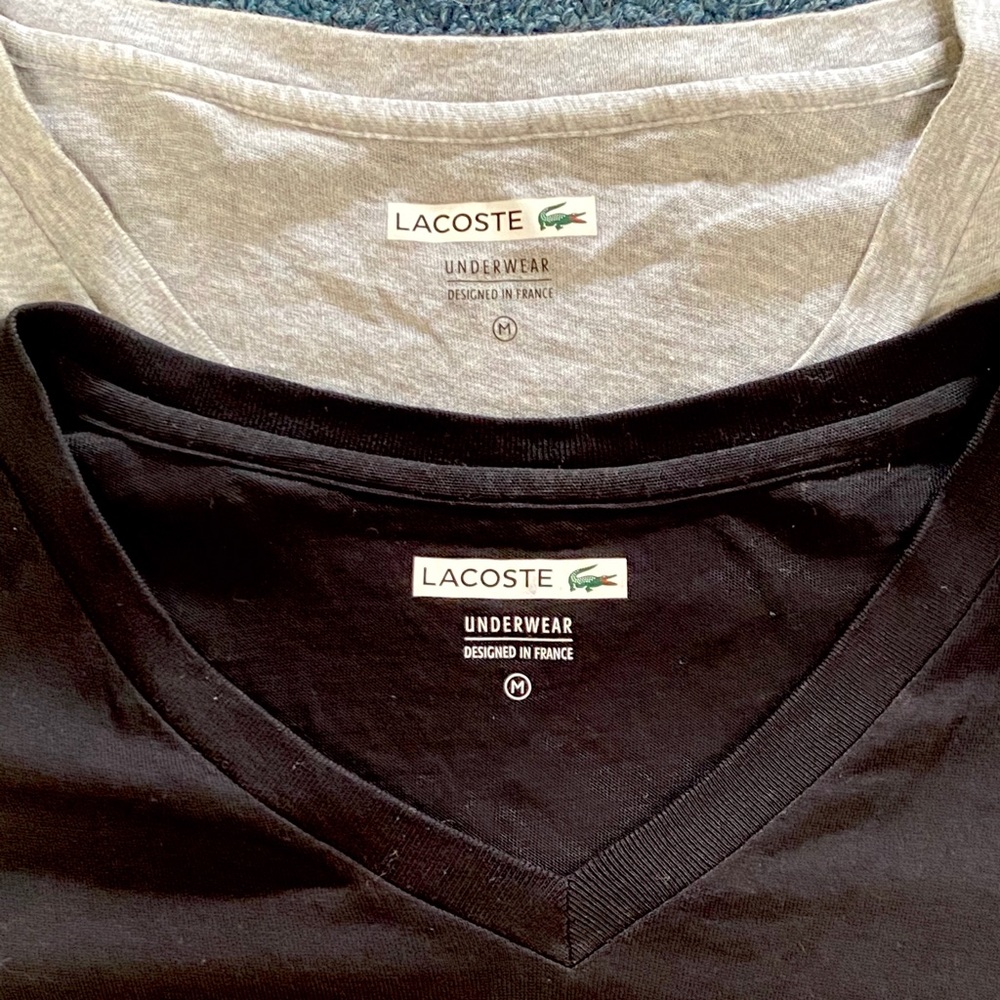 Two M men Lacoste shirts v neck